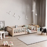 niskie łóżko z barierkami